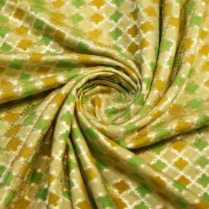 Pure cotton fabric with Rangkaat-style dyeing, diamond pattern, and golden zari weave in green and mustard tones