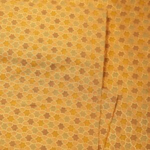 Pure cotton jacquard fabric with six-pointed star geometric motif and zari weave in golden and beige tones