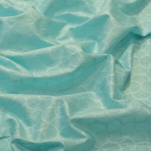 Aqua blue pure cotton jacquard fabric with circular geometric weave