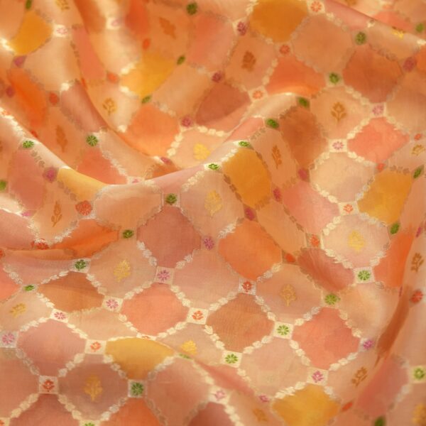 Peach and saffron pure organza Rangkaat fabric with golden zari diamond pattern and multicolor minakari motifs