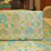Pure organza silk Rangkaat fabric in aqua and gold tones with floral zari pattern
