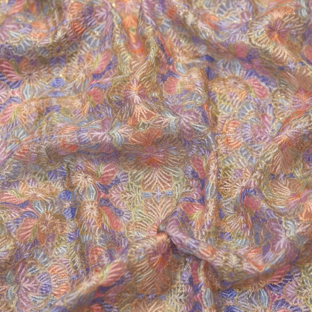 Pure organza fabric with blooming multicolor floral embroidery and golden Zari highlights