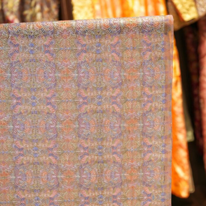 Pure organza fabric with blooming multicolor floral embroidery and golden Zari highlights