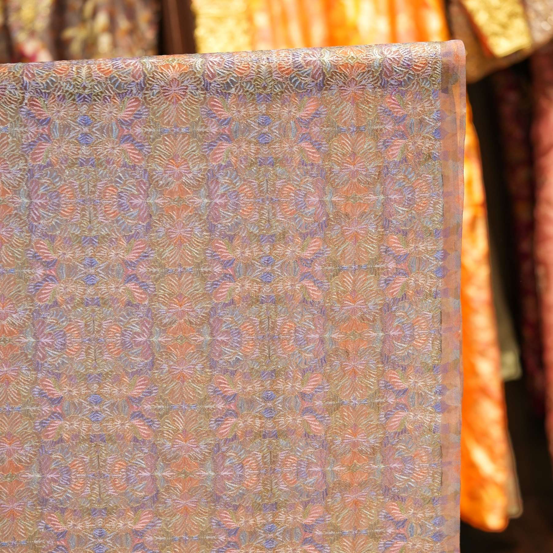 Pure organza fabric with blooming multicolor floral embroidery and golden Zari highlights