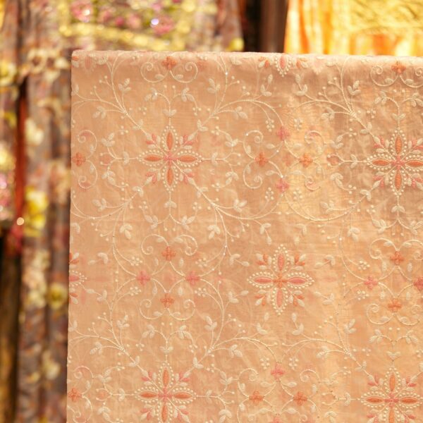 Pure organza fabric in soft blush pink with intricate thread embroidery in floral patterns