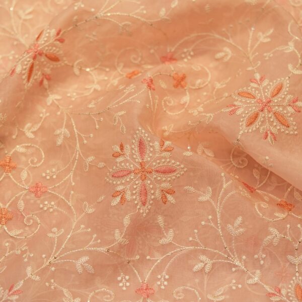 Pure organza fabric in soft blush pink with intricate thread embroidery in floral patterns