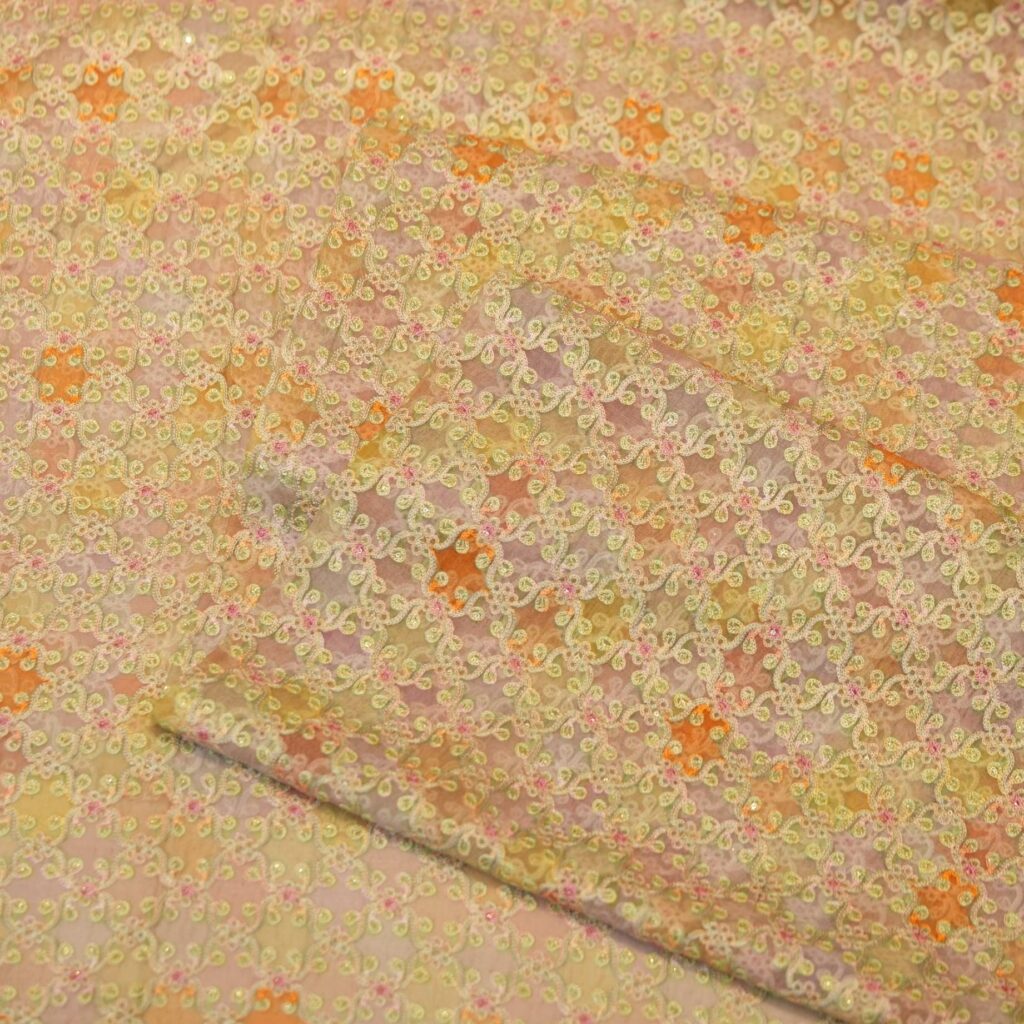 Hand-dyed pure organza fabric with multicolor aari embroidery in floral motifs – soft and sheer couture fabric