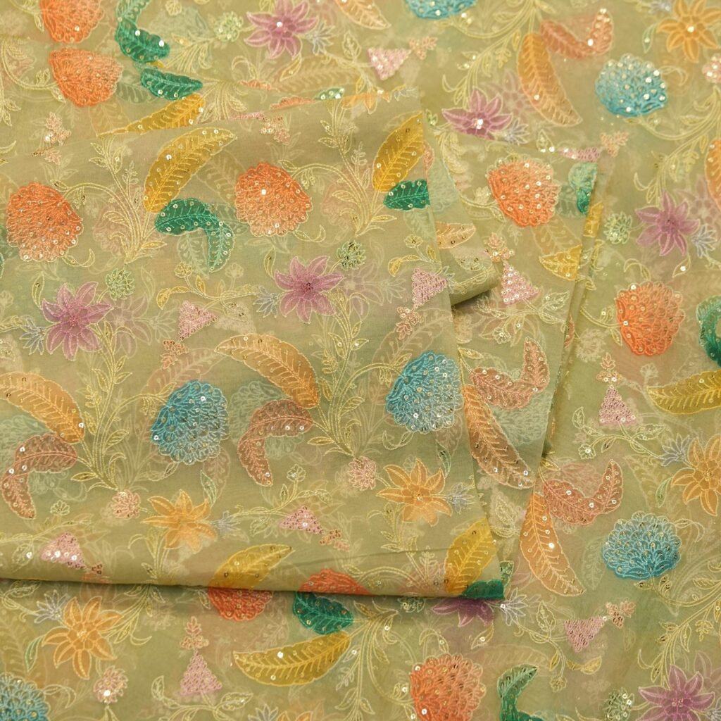 Pastel hand-dyed pure organza fabric with floral embroidery and sequin detailing – sheer couture fabric
