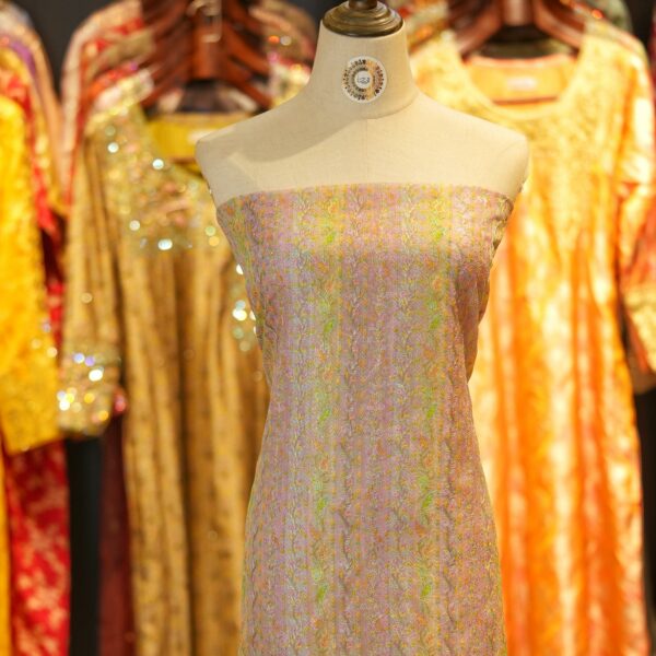 Pure organza fabric with hand-brushed pastel dye and vertical floral weave – sheer elegant textile