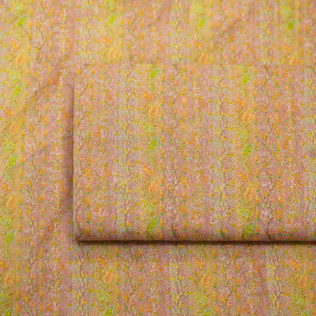 Pure organza fabric with hand-brushed pastel dye and vertical floral weave – sheer elegant textile