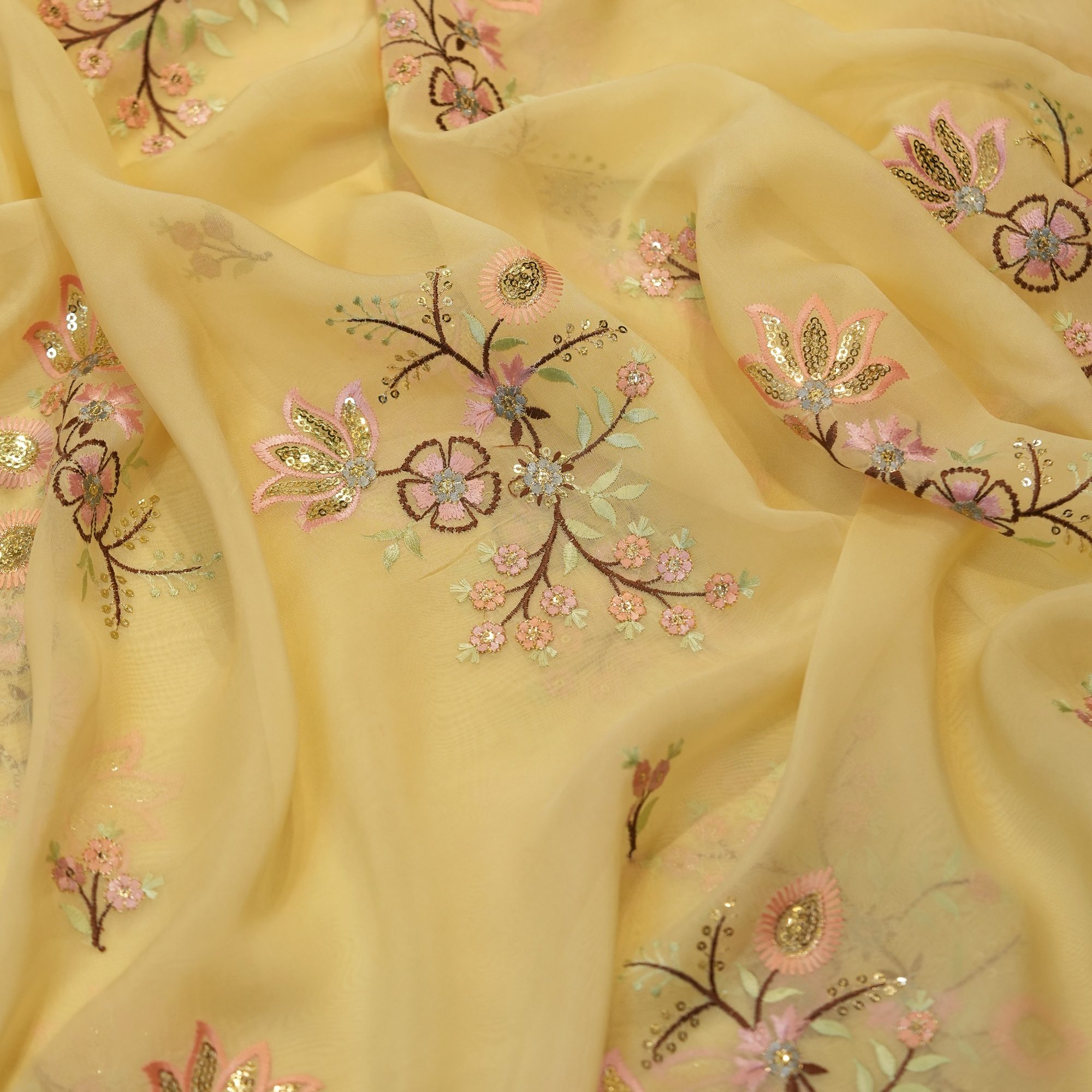 Yellow organza fabric with multicolor floral embroidery and sequin embellishments – luxury festive fabric