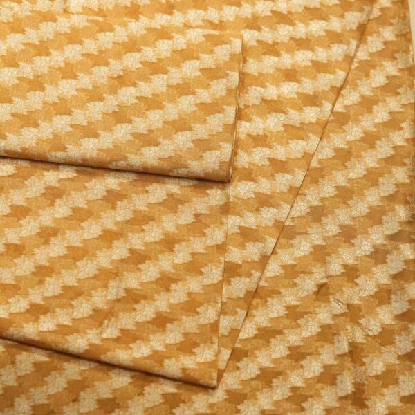 Golden pure organza fabric with cross-stripe zari jaal weave in floral patterns