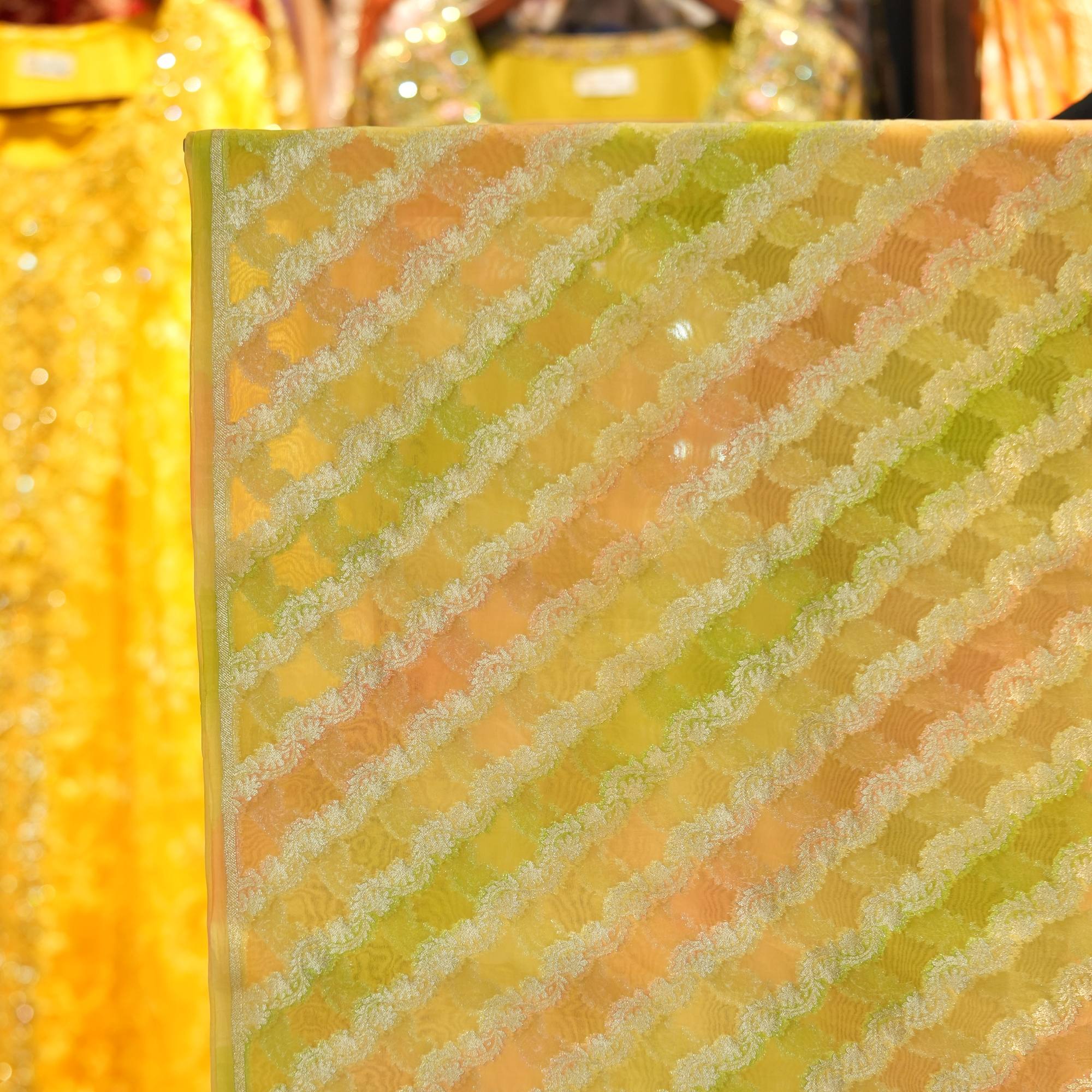Pure organza fabric with cross stripe floral Zari weave and multitone Rangkaat dye