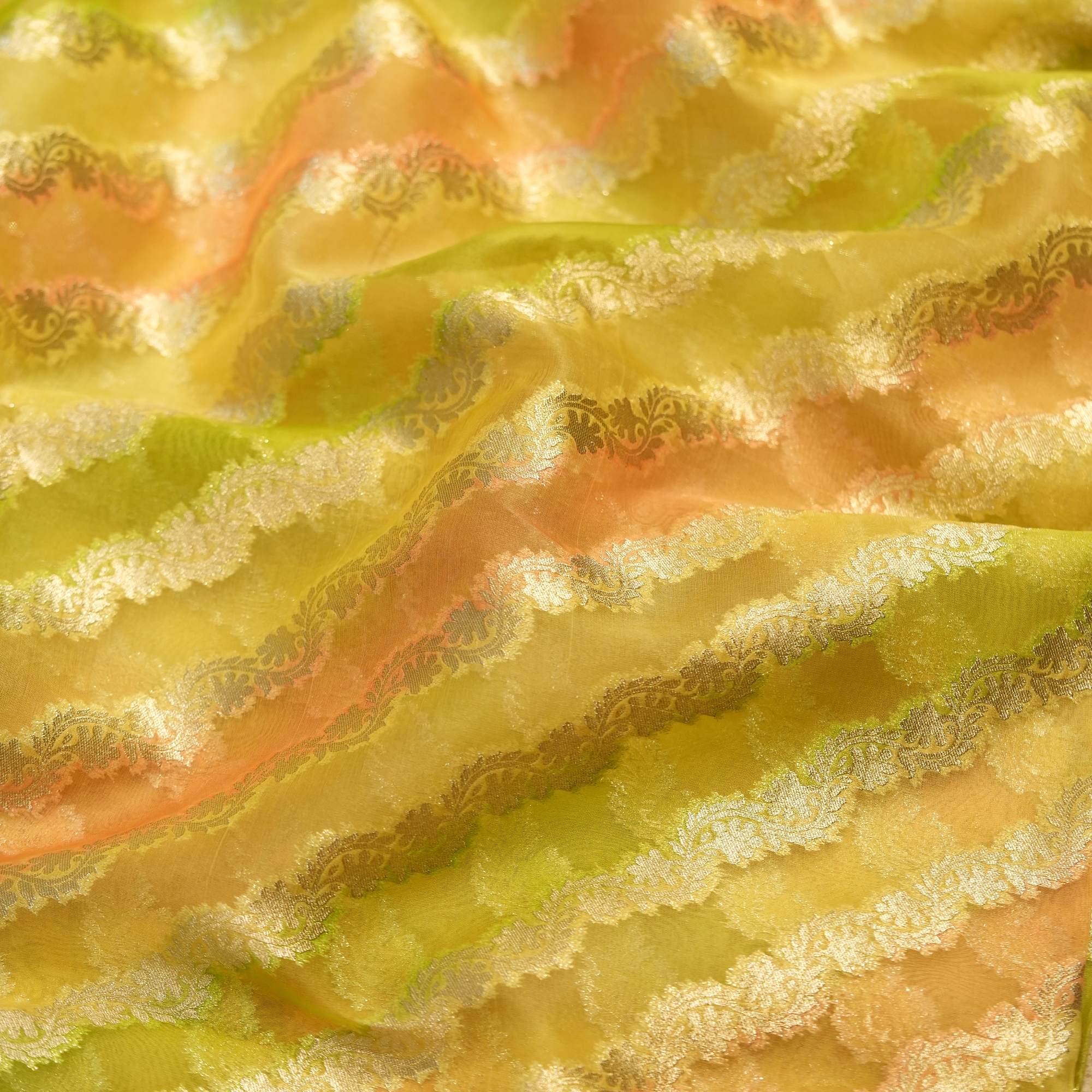 Pure organza fabric with cross stripe floral Zari weave and multitone Rangkaat dye