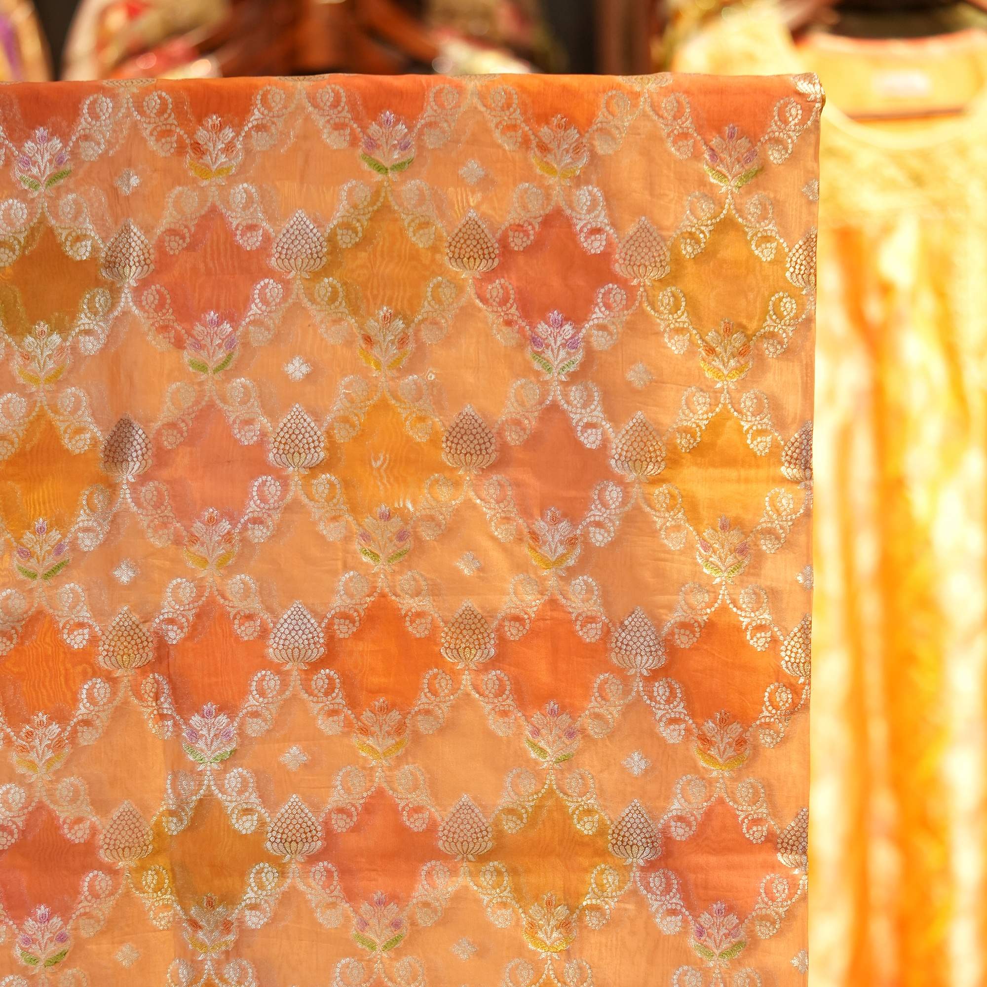 Pure organza fabric with Mughal-style floral Zari jaal and Rangkaat dye
