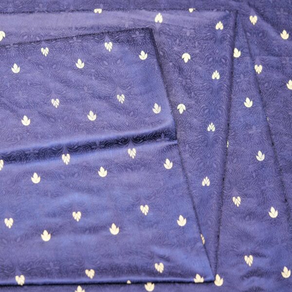 Midnight blue jamawar silk fabric with gold floral zari buti and embossed jacquard pattern