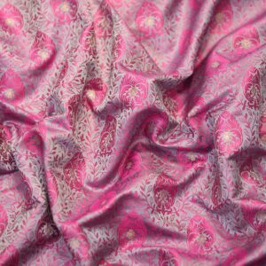 Pink tanchoi silk fabric with intricate jaal weave and subtle golden zari buti