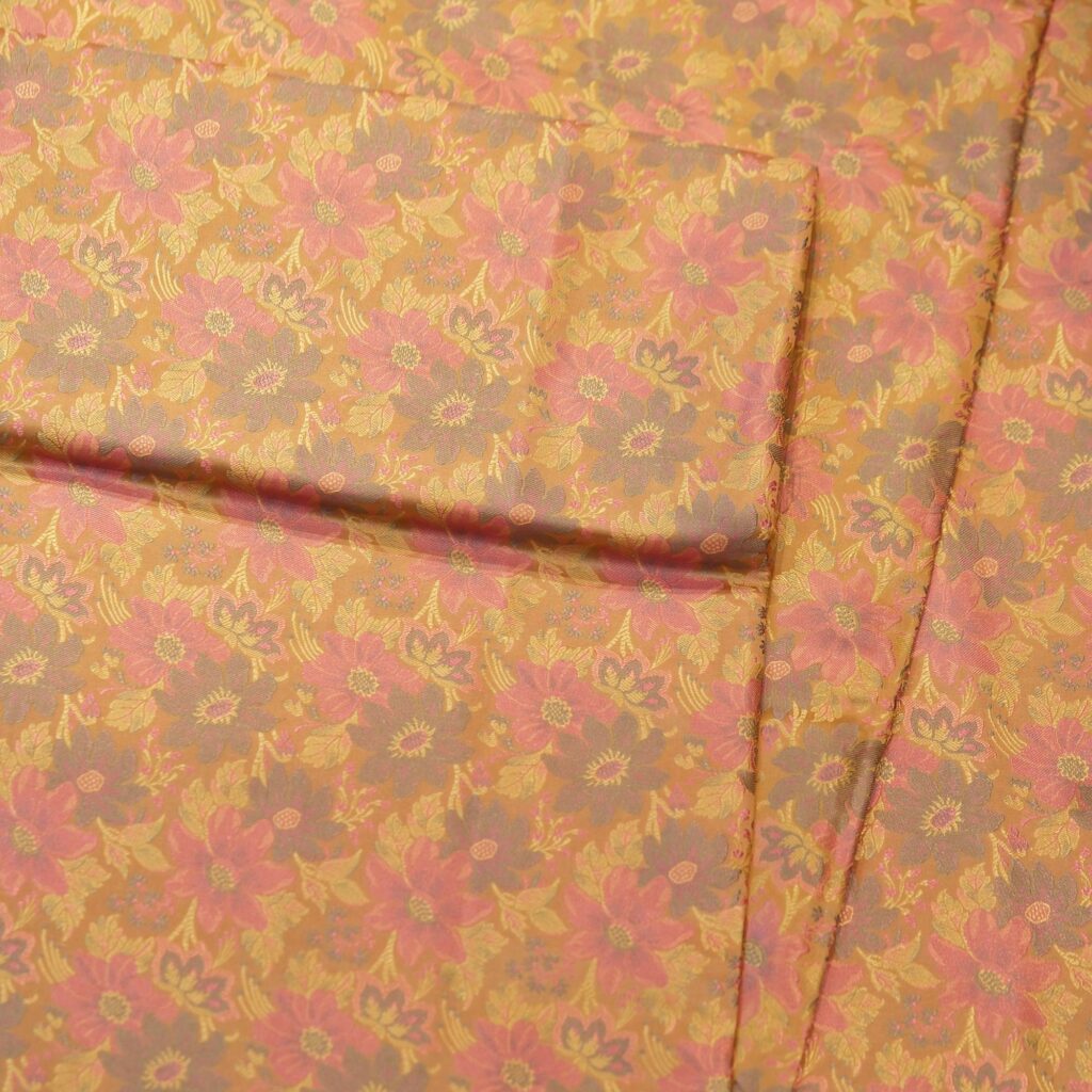 Golden resham silk fabric with woven multicolor floral Tanchoi design
