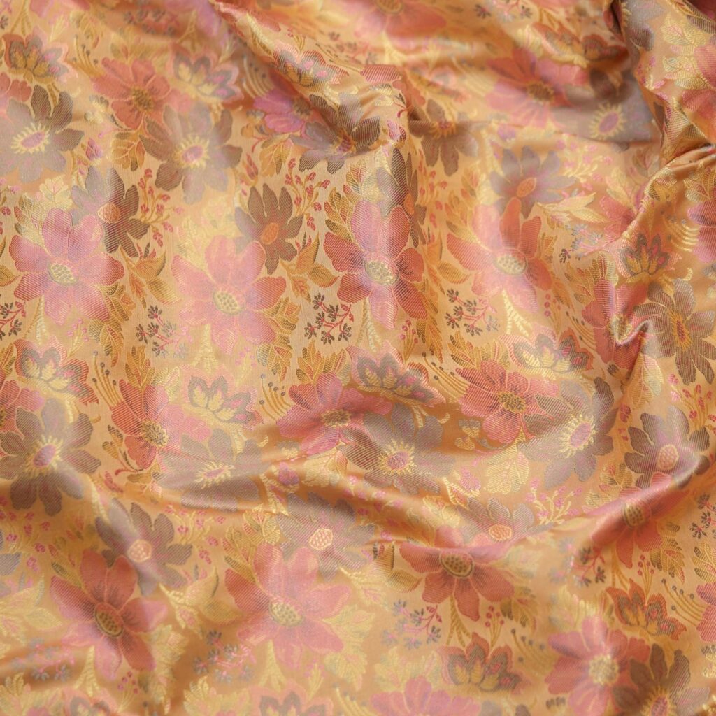 Golden resham silk fabric with woven multicolor floral Tanchoi design
