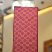 Pure handloom Tanchoi Jamawar resham silk fabric with geometric woven motifs in orange and magenta