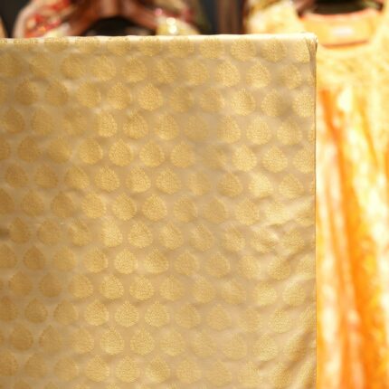 Pure handloom Tanchoi Jamawar resham silk fabric with Mughal leaf motifs in ivory and golden tones