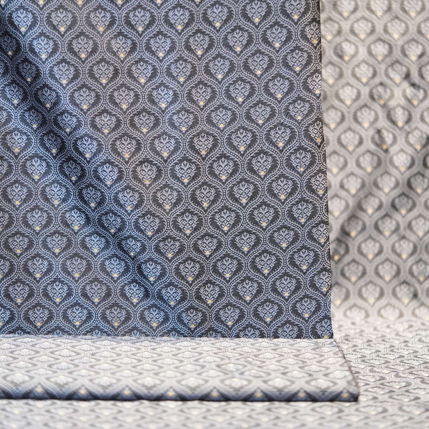 Pure Tanchoi Mughlai geometric Jamawar handloom silk fabric with Zari buti in shades of grey and silver