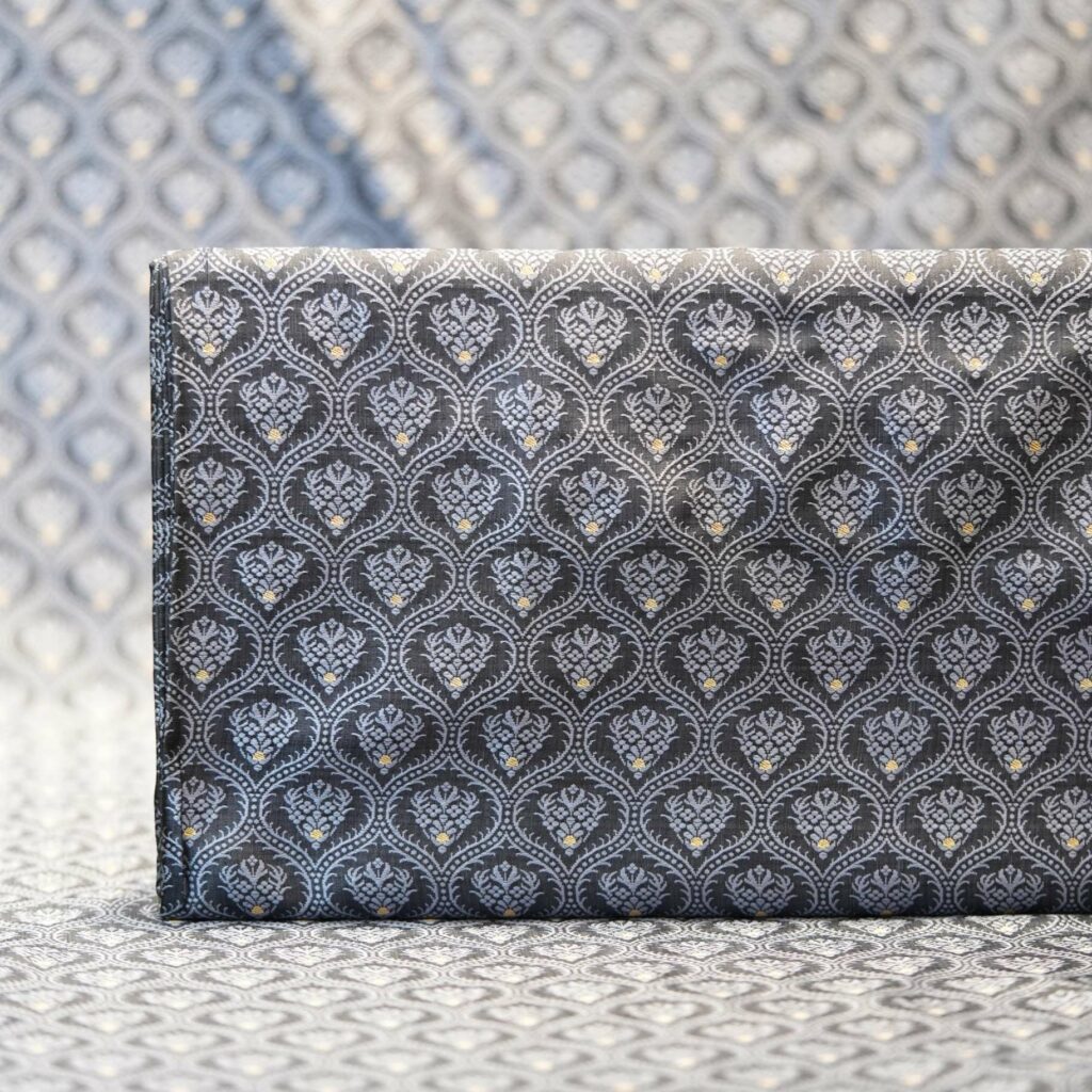 Pure Tanchoi Mughlai geometric Jamawar handloom silk fabric with Zari buti in shades of grey and silver