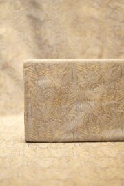 Pure Tanchoi floral jamawar handloom silk fabric in soft gold with intricate zari detailing