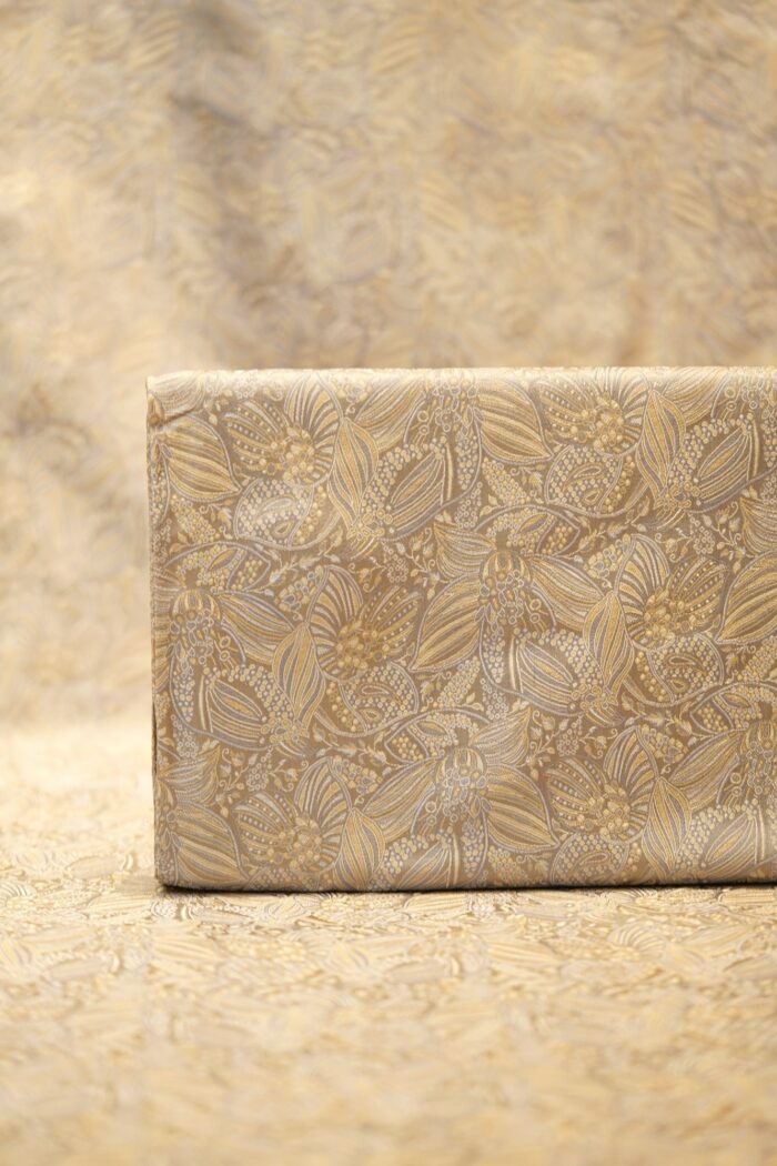 Pure Tanchoi floral jamawar handloom silk fabric in soft gold with intricate zari detailing