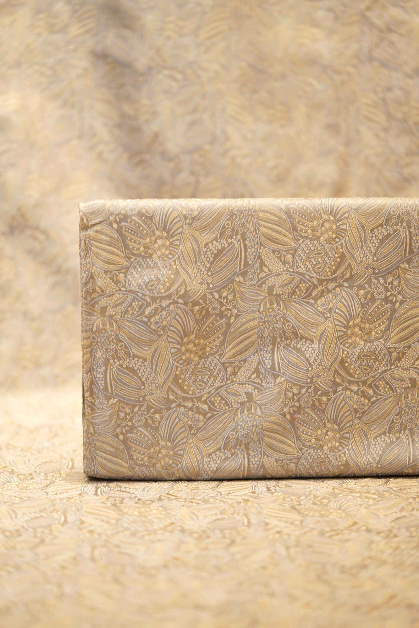 Pure Tanchoi floral jamawar handloom silk fabric in soft gold with intricate zari detailing