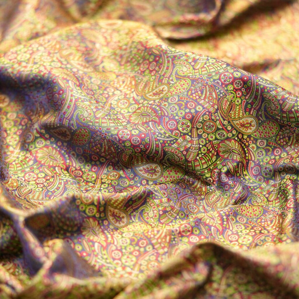 Pure handloom Tanchoi jamawar silk fabric with paisley and floral motifs in multicolor resham