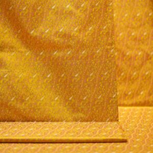 Golden Tanchoi jamawar silk fabric with diagonal Zari buta on pure kataan silk