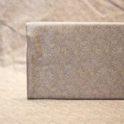 Elegant grey-beige Tanchoi jamawar handloom fabric in pure kataan silk with intricate paisley motifs