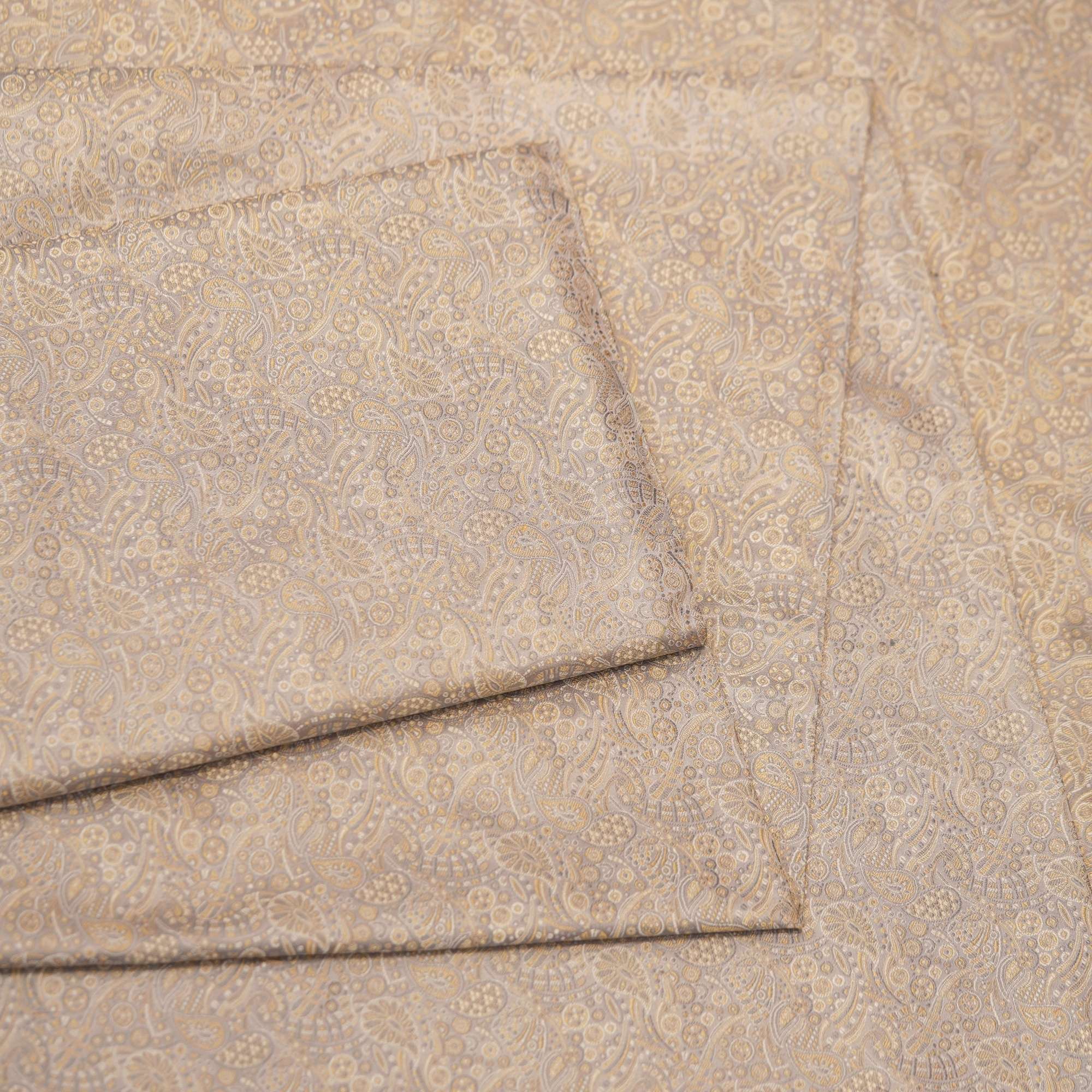 Elegant grey-beige Tanchoi jamawar handloom fabric in pure kataan silk with intricate paisley motifs