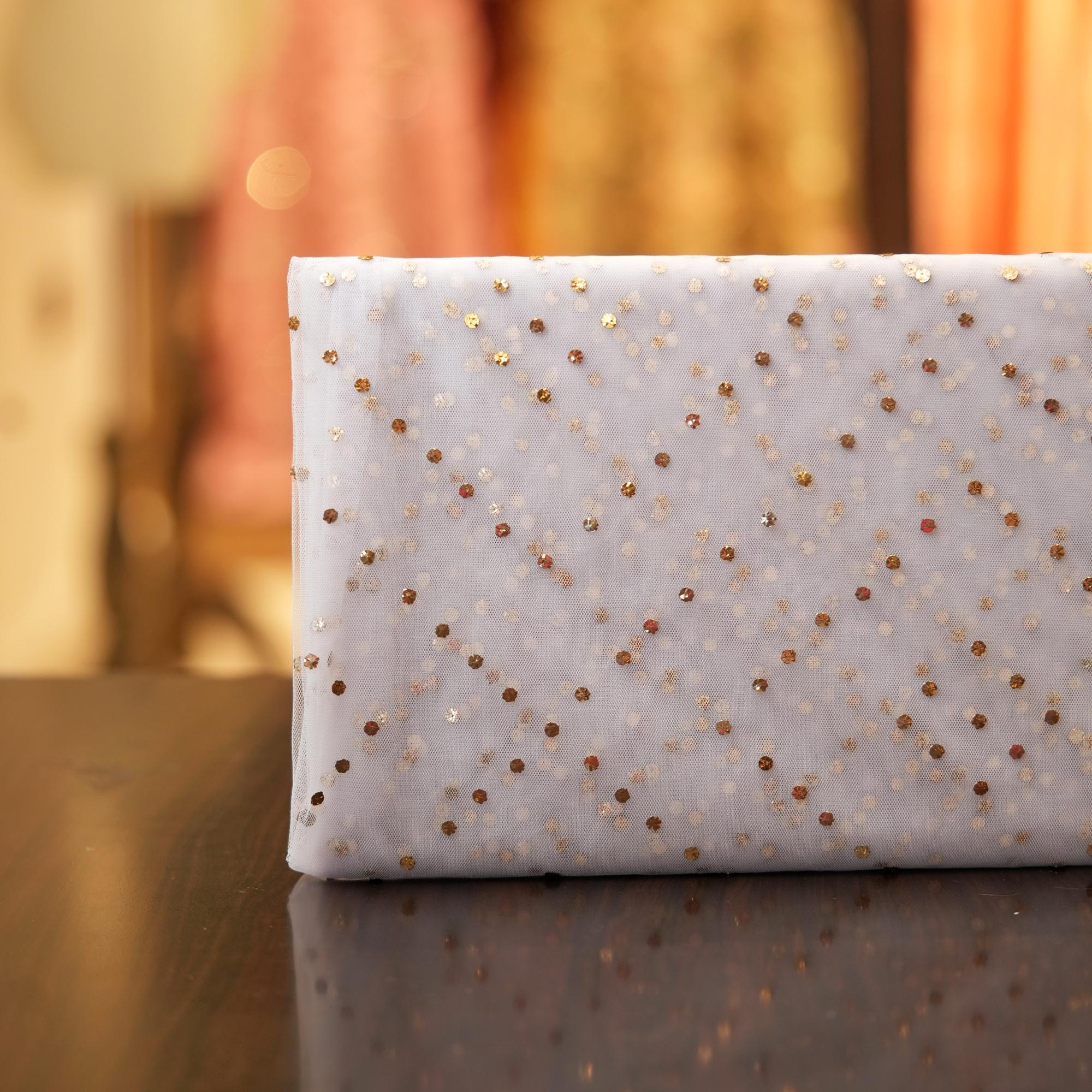 White net fabric with delicate mukaish work in geometric dotted pattern