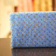 Blue net fabric with dense gold mukaish embroidery