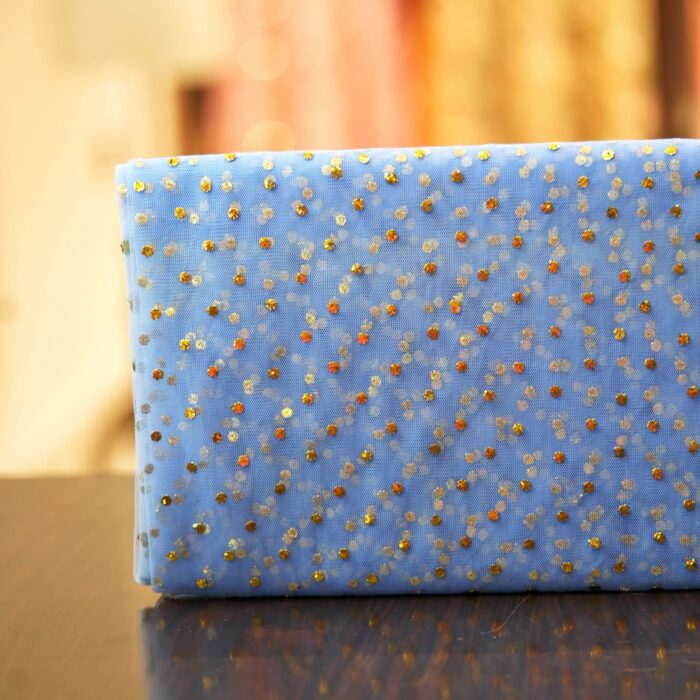 Blue net fabric with dense gold mukaish embroidery