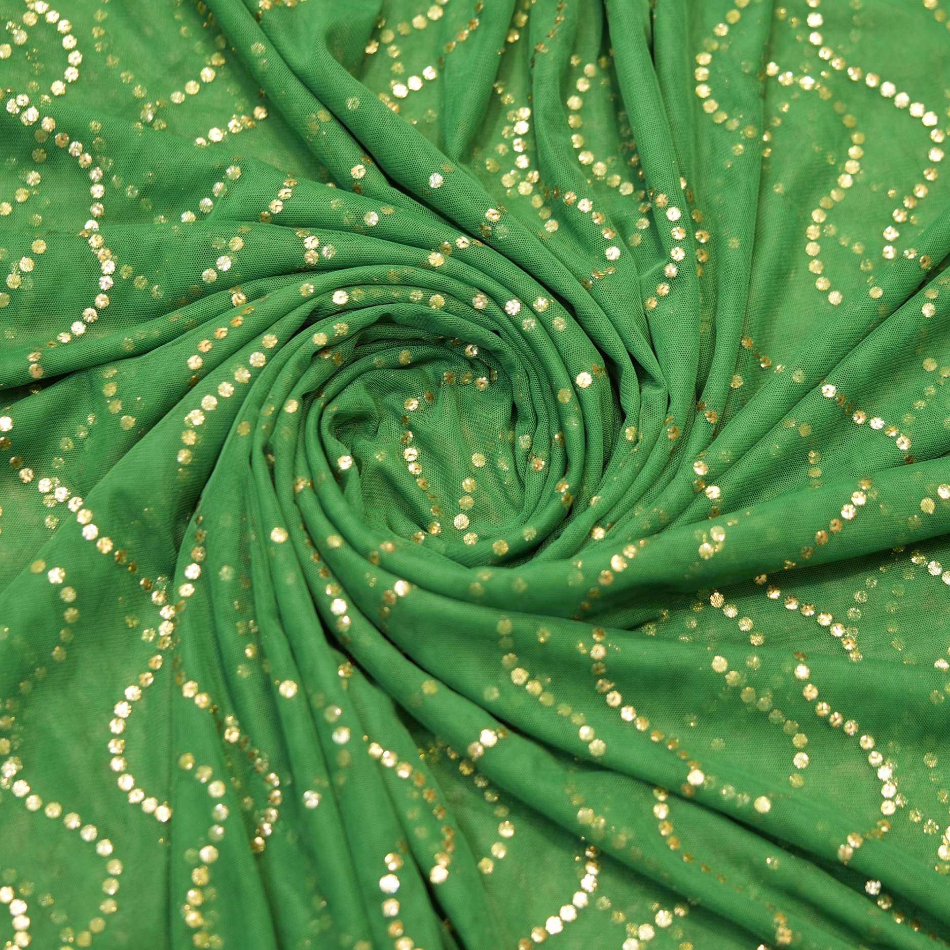 Green net fabric with zigzag mukaish embroidery pattern