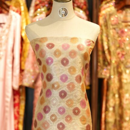 Katan silk fabric with octagonal Zari weaving and pink-orange ombre rangkaat dye