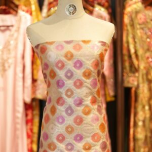 Katan silk fabric with octagonal Zari weaving and multicolor rangkaat dye in pink, orange, and lavender