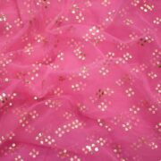 Pink net fabric with shimmering cascading Mukaish floral dots