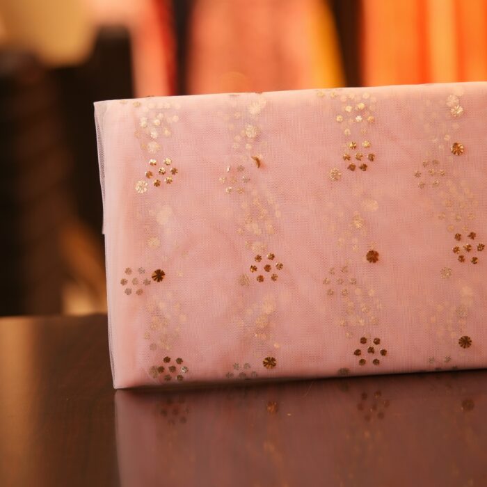 Blush pink net fabric with golden and silver Mukaish floral foil pattern