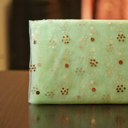Mint green net fabric with floral Mukaish work in gold and silver foil dots