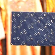 Navy blue net fabric with hand Mukaish foil work in diagonal clustered pattern