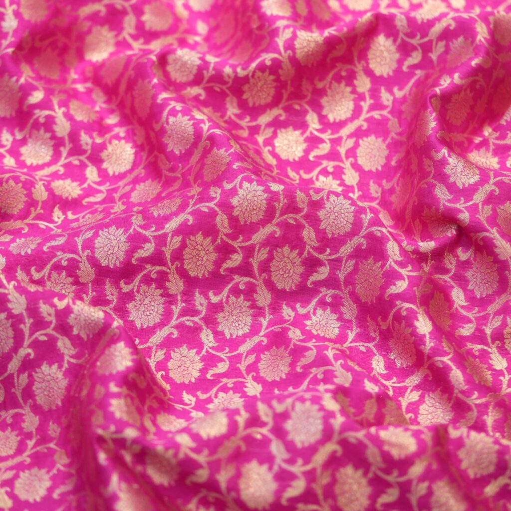 Fuchsia pink Indian silk fabric with gold Zari floral motifs – Gulnaaz collection
