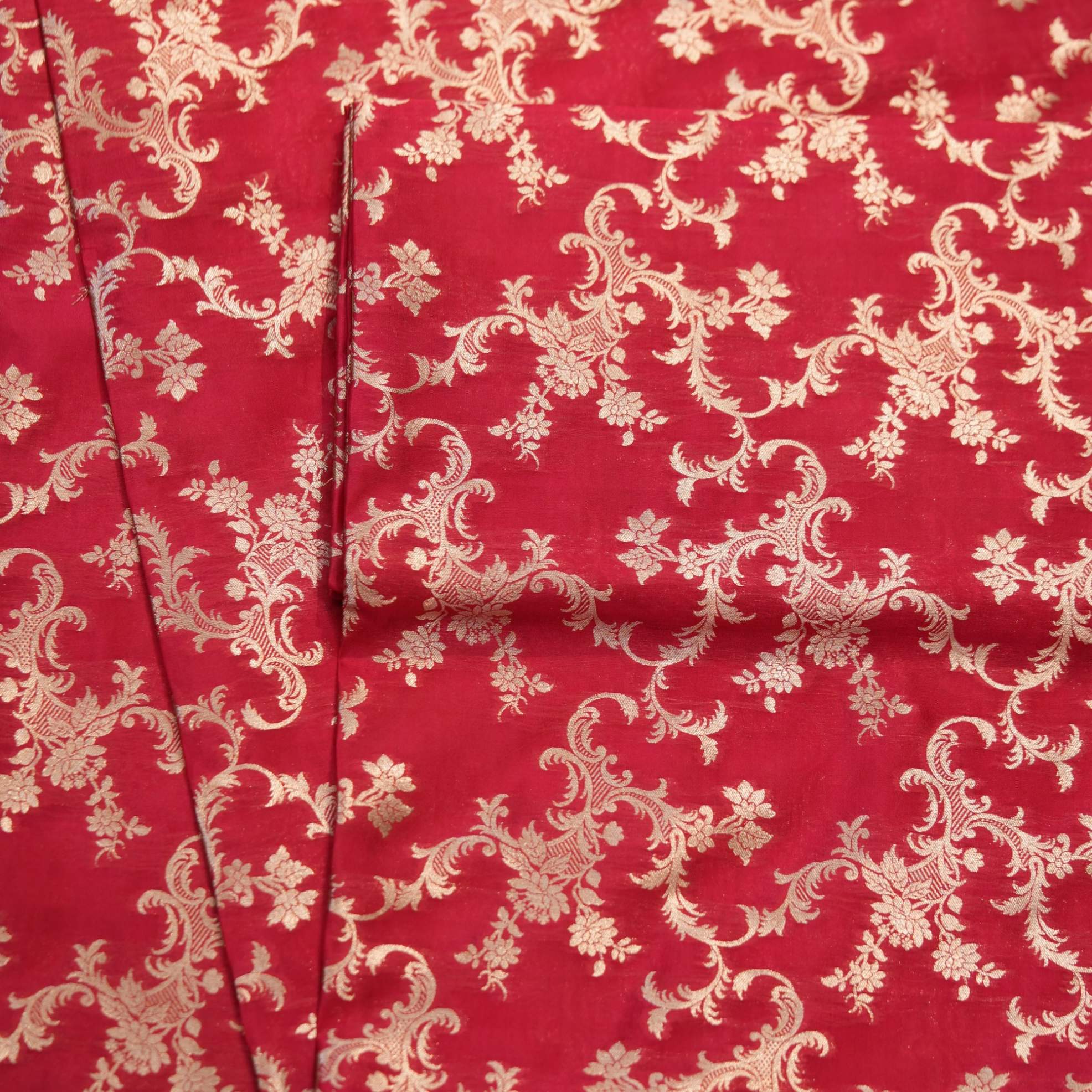 Crimson red Dupion silk with intricate floral light gold zari weaving