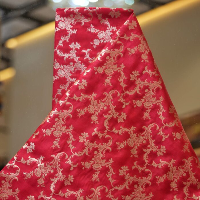 Crimson red Dupion silk with intricate floral light gold zari weaving