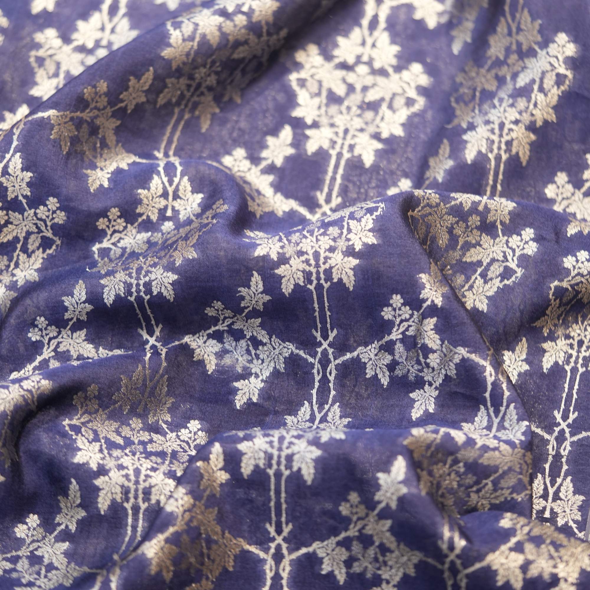 Royal blue dupion silk with light gold Zari trellis floral weaving