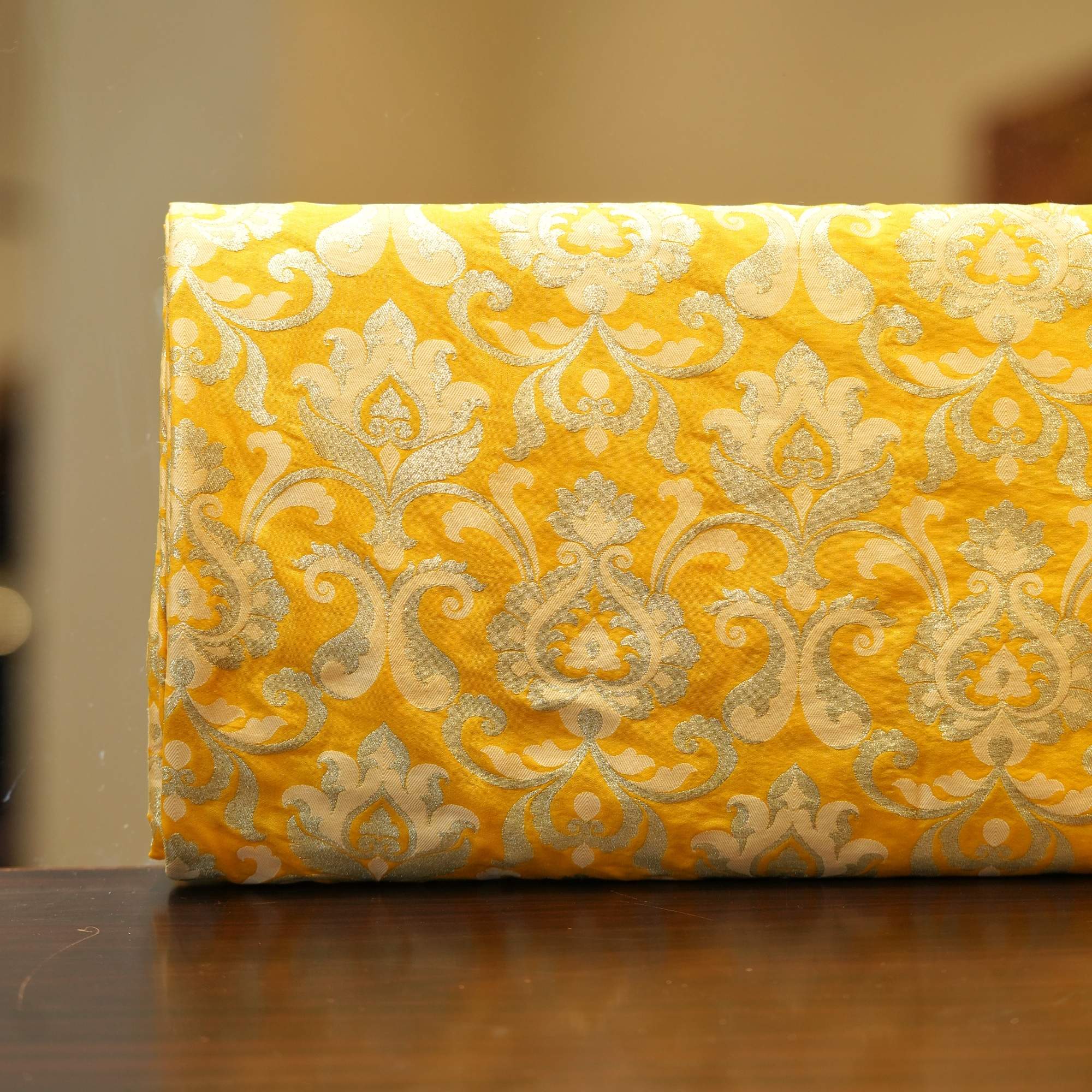 Yellow Indian silk fabric with intricate Persian-style Zari jaal in light gold