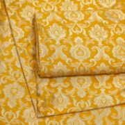 Yellow Indian silk fabric with intricate Persian-style Zari jaal in light gold